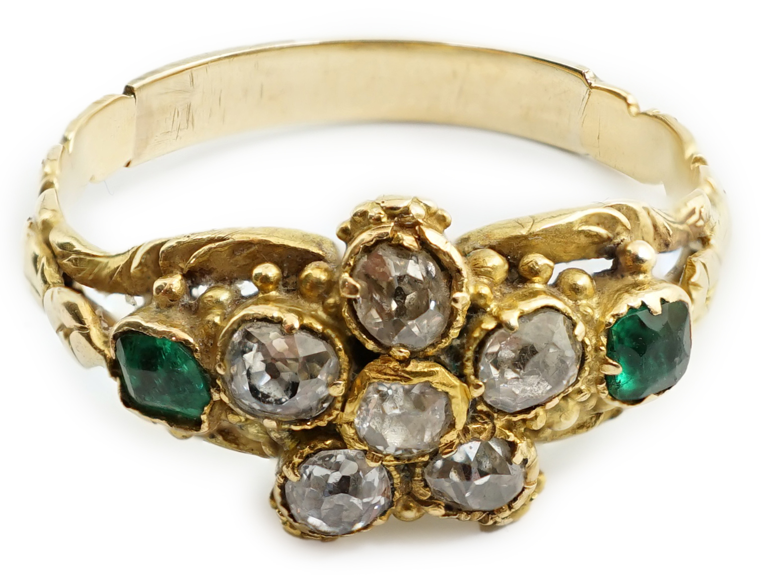 A Victorian gold, emerald and diamond set cluster ring